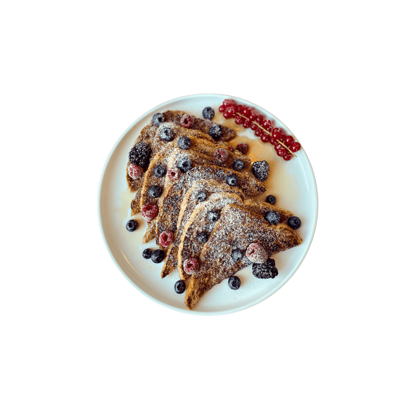 French toast triangles dusted with sugar and topped with berries