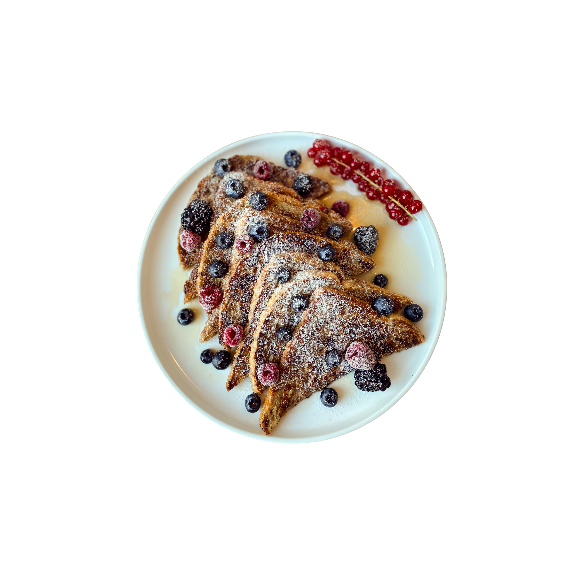 French toast triangles dusted with sugar and topped with berries