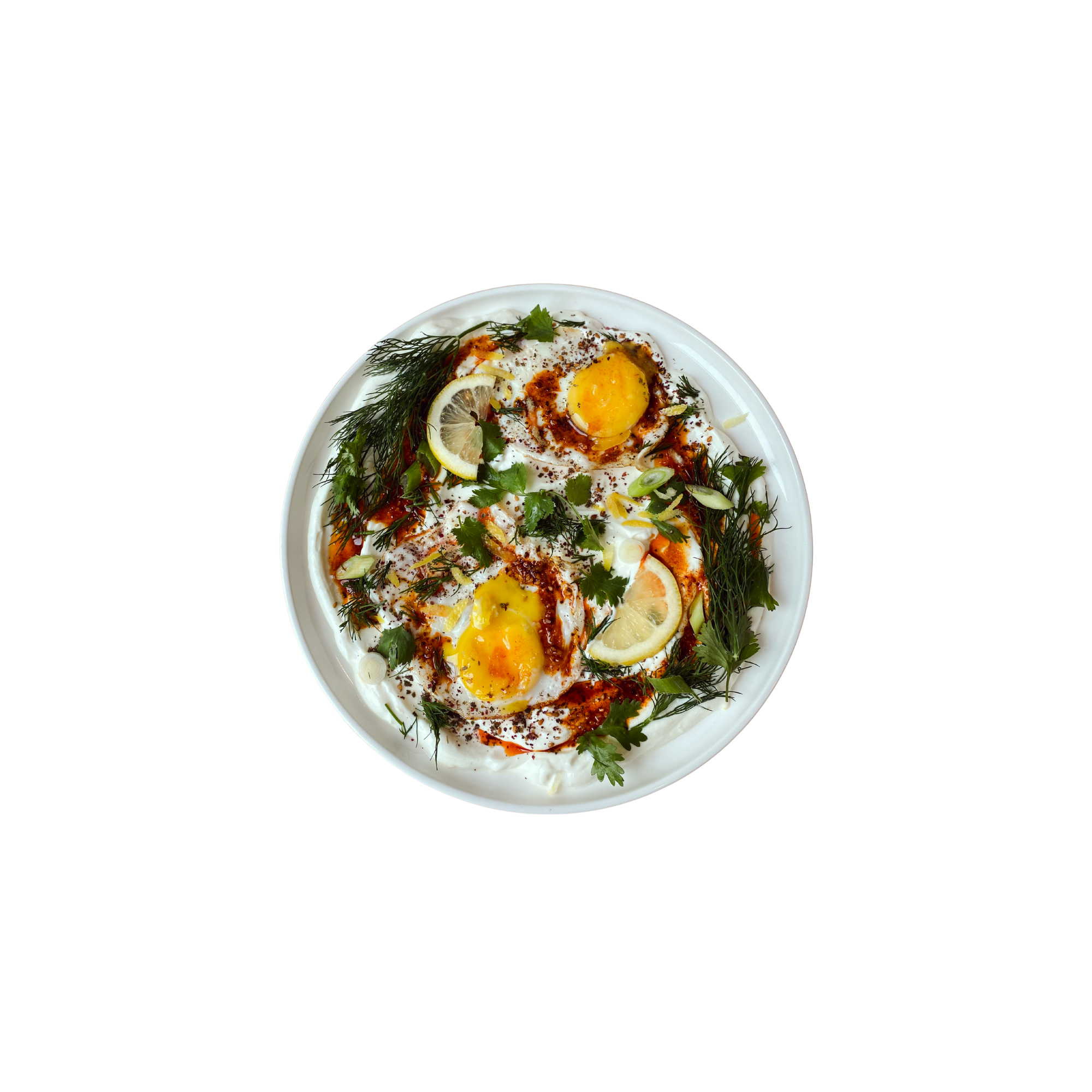 Turkish-style eggs with herbs, chili oil, and yogurt